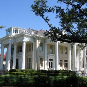 a statue in front of a building