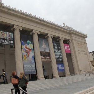 a person standing in front of a building